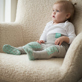 rompers on sofa