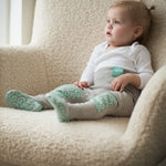 rompers on sofa